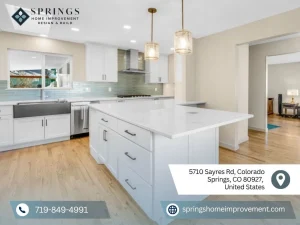 Open-concept remodeled kitchen featuring quartz countertops, shaker cabinets, and wood flooring
