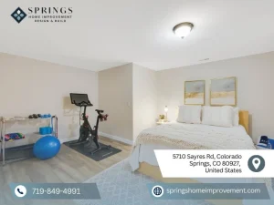 Springs Home Improvement basement remodel featuring bedroom and workout zone