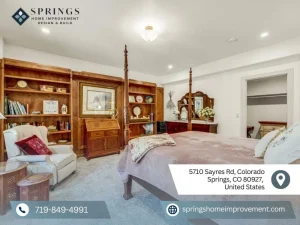 Traditional basement design by Springs Home Improvement with warm tones